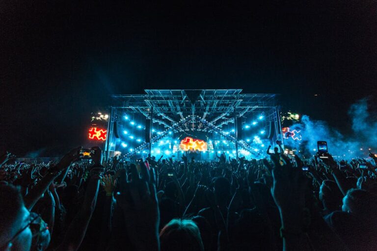 Crowd in front of illuminated stage at Tomorrowland festival